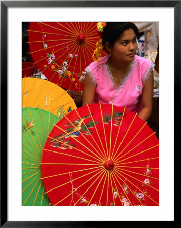 Water Dai Woman With Colourful Umbrellas, Xishuangbanna, China by Keren Su Pricing Limited Edition Print image