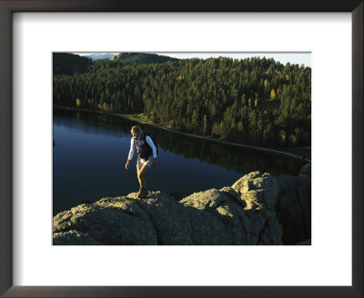 Young Woman Hiking A Rocky Rim Above Sylvan Lake by Bobby Model Pricing Limited Edition Print image