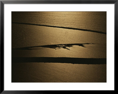 The Setting Sun Reflects Off A Beach In Olympic National Park by Sam Abell Pricing Limited Edition Print image