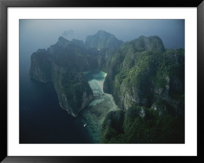 Mountainous Phi Phi Island Rises From The Sea by Jodi Cobb Pricing Limited Edition Print image