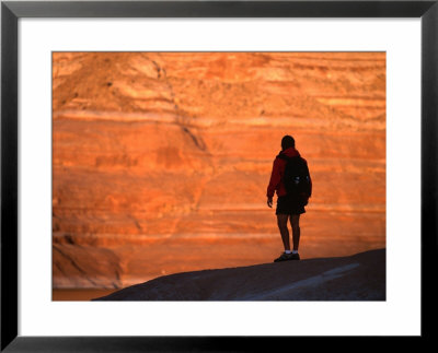 Silhouette Of Hiker In Padre Bay, Lake Powell, Utah, Usa by Cheyenne Rouse Pricing Limited Edition Print image