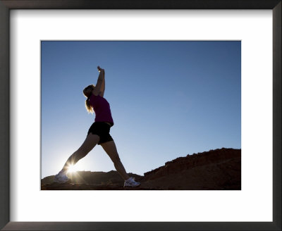 Woman Stretching, Monument Valley Navajo Tribal Park, Arizona Utah Border by Angelo Cavalli Pricing Limited Edition Print image