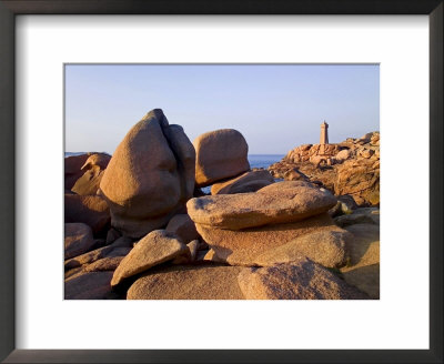 Sunset Over Rocks And Lighthouse At Pars-Kamor, Ploumanach, Breton Corniche, Cotes D'armor by David Hughes Pricing Limited Edition Print image