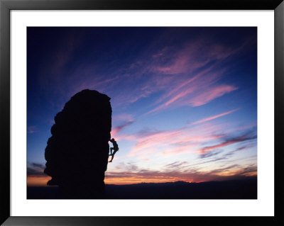 A Climber Leads A Route Up A Rock Spire by Bill Hatcher Pricing Limited Edition Print image