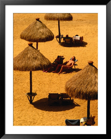 Man Sunbathing On Private Beach Of Mt. Lavinia Hotel, Colombo, Sri Lanka by Dallas Stribley Pricing Limited Edition Print image