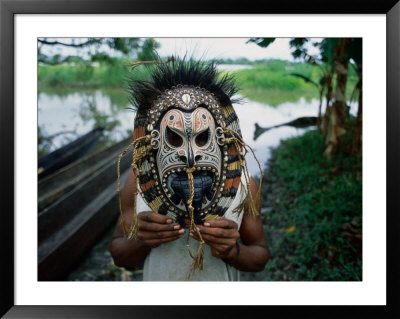 Traditional Mask Carving From Tambanum Village, Tambanum, East Sepik, Papua New Guinea by Jerry Galea Pricing Limited Edition Print image