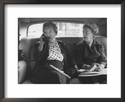 Woman Talking On Her Car Phone by Walter Sanders Pricing Limited Edition Print image