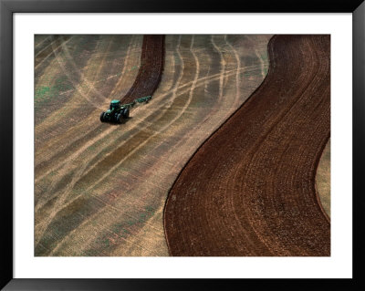 Tractor Ploughing Field Near Anthony, Kansas, Usa by Jim Wark Pricing Limited Edition Print image