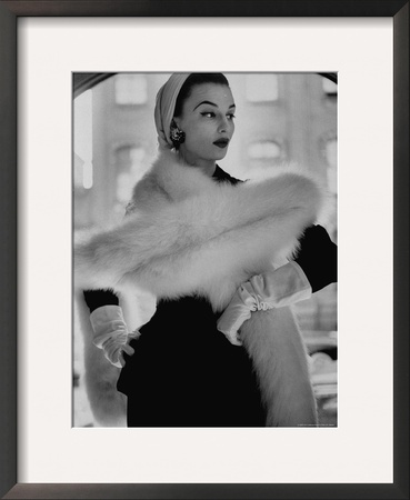 Lady Modeling A Boa Made Out Of Six Rounded Skins Of Natural White Fox, Selling For $350 by Gordon Parks Pricing Limited Edition Print image