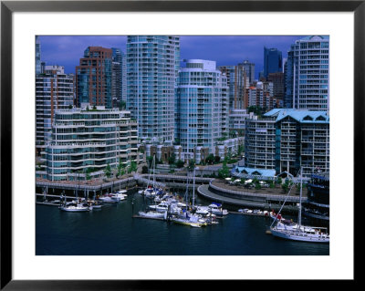 Aerial View Of Apartment Buildings On The Waterfront At False Creek, Vancouver, Canada by Mark & Audrey Gibson Pricing Limited Edition Print image