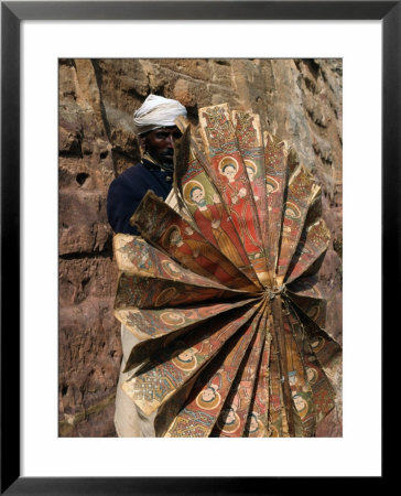 Priest Holding 15Th Century Ceremonial Fan At Debre Tsion Rock Hewn Church In Cheralta, Ethiopia by Ariadne Van Zandbergen Pricing Limited Edition Print image