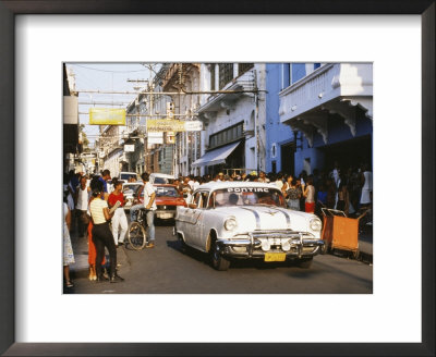 Old Pontiac, An American Car Kept Working Since Before The Revolution, Santiago De Cuba, Cuba by Tony Waltham Pricing Limited Edition Print image