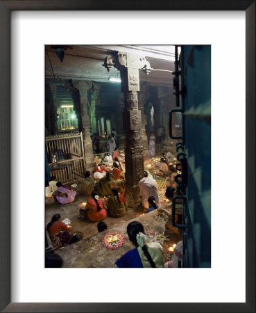 Worshippers At A Shrine Inside The Sri Meenakshi Temple, Madurai, Tamil Nadu State, India by Richard Ashworth Pricing Limited Edition Print image
