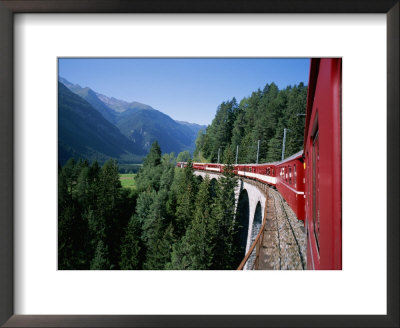 The Glacier Express Crosses A Bridge In Switzerland by Taylor S. Kennedy Pricing Limited Edition Print image