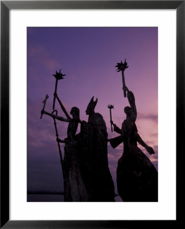 Slender Statues On Coastline At Dusk, Puerto Rico by Greg Johnston Pricing Limited Edition Print image