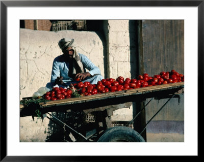 Merchant Selling Fruit Off Cart, Aswan, Egypt by Jerry Galea Pricing Limited Edition Print image