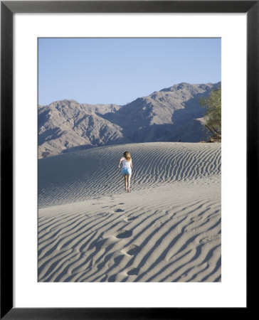 Woman Jogging, Sand Dunes Point, Death Valley National Park, California, Usa by Angelo Cavalli Pricing Limited Edition Print image