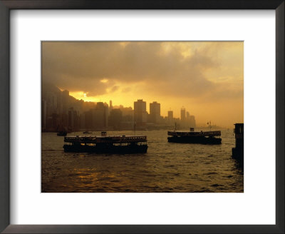 Ferries Silhouetted On The Harbour At Sunset, Hong Kong by Richard I'anson Pricing Limited Edition Print image