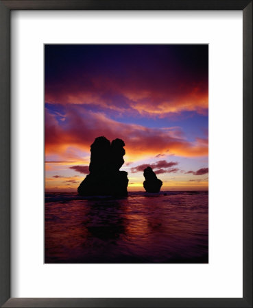 The Twelve Apostles Silhouetted At Sunset, Port Campbell National Park, Victoria, Australia by Richard I'anson Pricing Limited Edition Print image