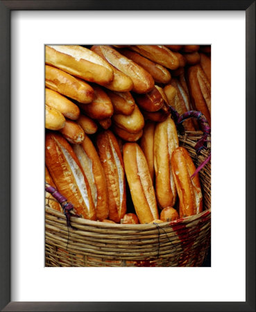 Baguettes In Basket At Central Market, Can Tho, Vietnam by Richard I'anson Pricing Limited Edition Print image