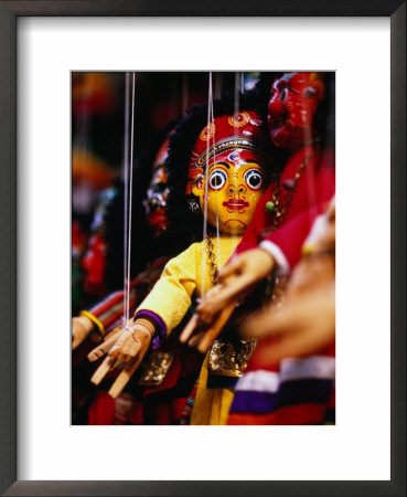 Marionettes Of Hindu Deities Hanging Outside Shop, Kathmandu, Nepal by Ryan Fox Pricing Limited Edition Print image