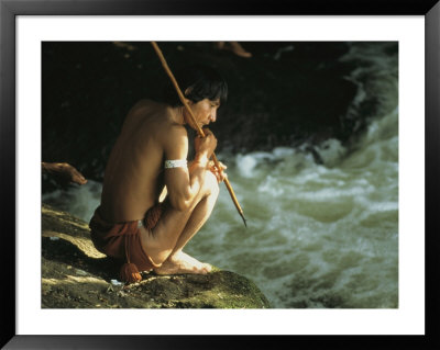 A Pinare Indian Sits By A Stream Fishing by Ed George Pricing Limited Edition Print image