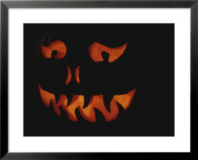Silhouette Of A Smiling Face On A Jack-O-Lantern by Stephen Sharnoff Pricing Limited Edition Print image