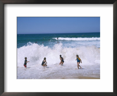 Children Playing In The Surf, Near Gosford, New South Wales, Australia by Ken Wilson Pricing Limited Edition Print image