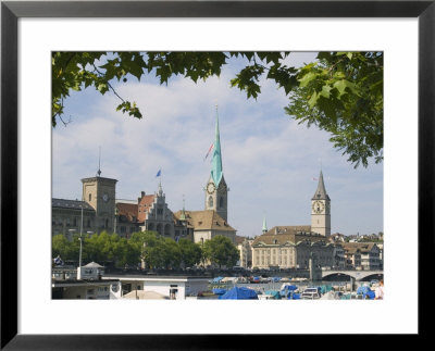Boats On The Limmat River With St. Peter Church And Fraumunster Church Behind, Zurich, Switzerland by Christian Kober Pricing Limited Edition Print image