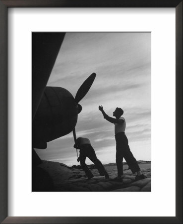 Us Marines Pushing Through The Props Of Bomber At Us Naval Base On Midway Island by Frank Scherschel Pricing Limited Edition Print image