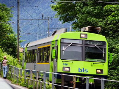 Train Departs Interlaken Ost Train Station, Interlaken, Switzerland by Robert Eighmie Pricing Limited Edition Print image