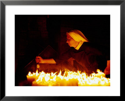 Nun Attending Candles At Stone Gate Shrine, Zagreb, City Of Zagreb, Croatia by Richard I'anson Pricing Limited Edition Print image