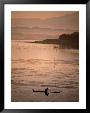 Bamboo Fishing Raft On Dawn Waters Of Paoay Lake, Ilocos Norte, Philippines by John Pennock Pricing Limited Edition Print image