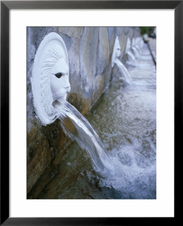 Nineteen Heads Lions Fountain, Venetian Fountain, Spili, Island Of Crete, Greece by Marco Simoni Pricing Limited Edition Print image