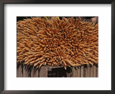 A Huge Bundle Of Carrots Fills A Sidewalk Stall by Jodi Cobb Pricing Limited Edition Print image