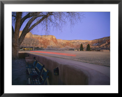 The Red Tailights Of A Truck Color This Twilight View Of Ghost Ranch by Stephen St. John Pricing Limited Edition Print image