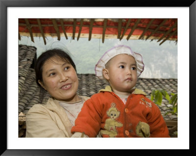 Mother And Child Of The Miao People Of Chongqing Province, China by David Evans Pricing Limited Edition Print image