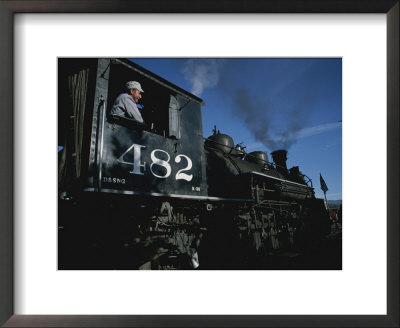 A Steam Engine Engineer Looks Out The Window Of The Engine by Taylor S. Kennedy Pricing Limited Edition Print image