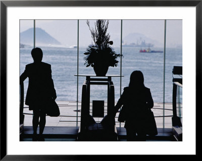 People On Escalators At China Hong Kong City Complex, Tsimshatsui, Kowloon, Hong Kong, China by Lawrence Worcester Pricing Limited Edition Print image