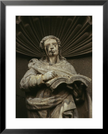 A Statue Of A Person Holding An Open Book by Raul Touzon Pricing Limited Edition Print image
