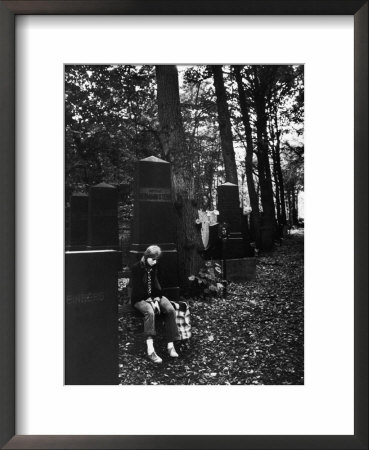 Girl Visiting Her Father's Grave In The Jewish Cemetery Weissensee by Alfred Eisenstaedt Pricing Limited Edition Print image