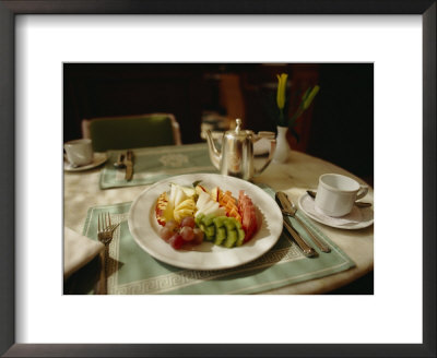 A Fruit Plate Of Pineapple, Kiwi, Papaya, Grapes, Apple, And Watermelon by Eightfish Pricing Limited Edition Print image