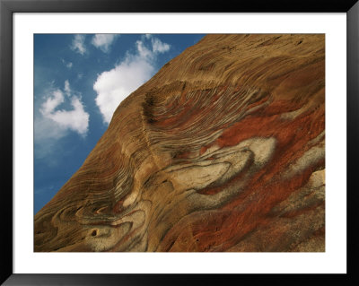 Waves Of Color Drift Through A Sandstone Rock Face by Annie Griffiths Belt Pricing Limited Edition Print image