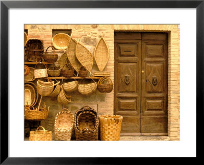 Montalcino, Basket Seller And Wall, Tuscany, Italy by Walter Bibikow Pricing Limited Edition Print image