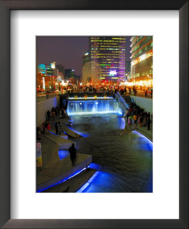 The Cheonggyecheon Stream Draws Crowds Of Locals Out In Early Evening, Seoul, South Korea by Anthony Plummer Pricing Limited Edition Print image
