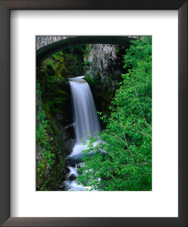 Christine Falls Through The Arch Of A Stone Bridge, Mt. Rainier National Park, Usa by Brent Winebrenner Pricing Limited Edition Print image