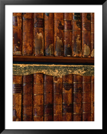 Detail Of Rare, Old, Leatherbound Books On Shelf, Oxford, England by Jon Davison Pricing Limited Edition Print image