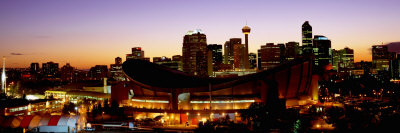 Buildings Illuminated At Night, Calgary, Alberta, Canada by Panoramic Images Pricing Limited Edition Print image