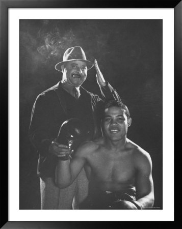 Boxer Joe Louis Seated In Front Of His Cigar Smoking Manager, John Roxborough by Gjon Mili Pricing Limited Edition Print image