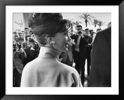 Natalie Wood With Warren Beatty Surrounded By Photographers by Paul Schutzer Pricing Limited Edition Print image